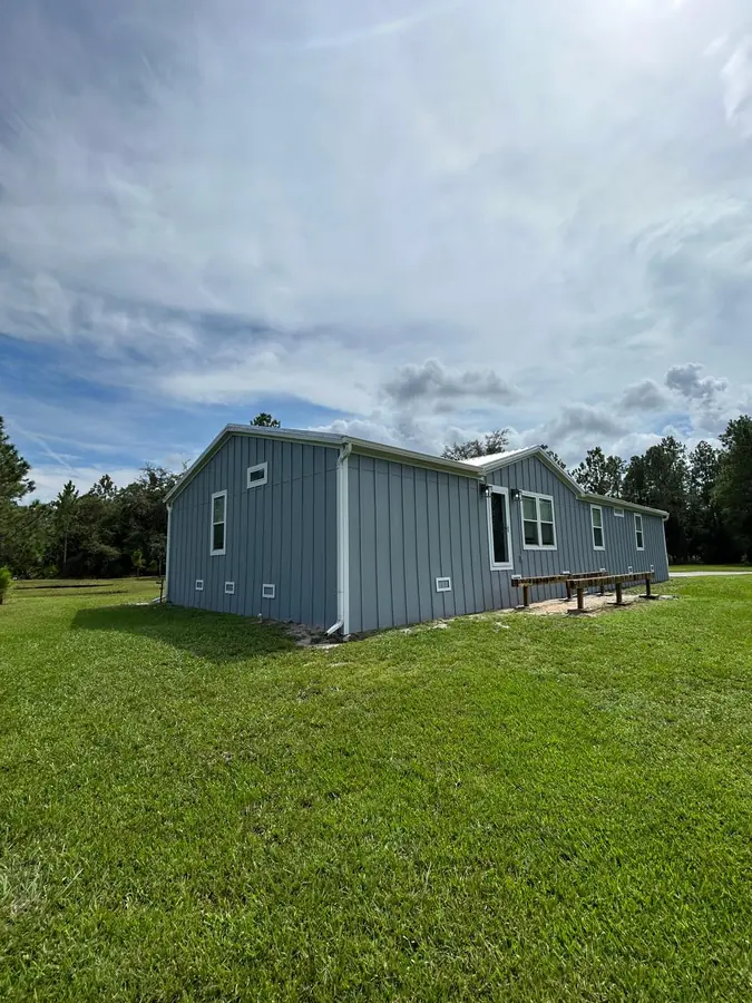 Completed residential siding installation by Endless Siding in Florida