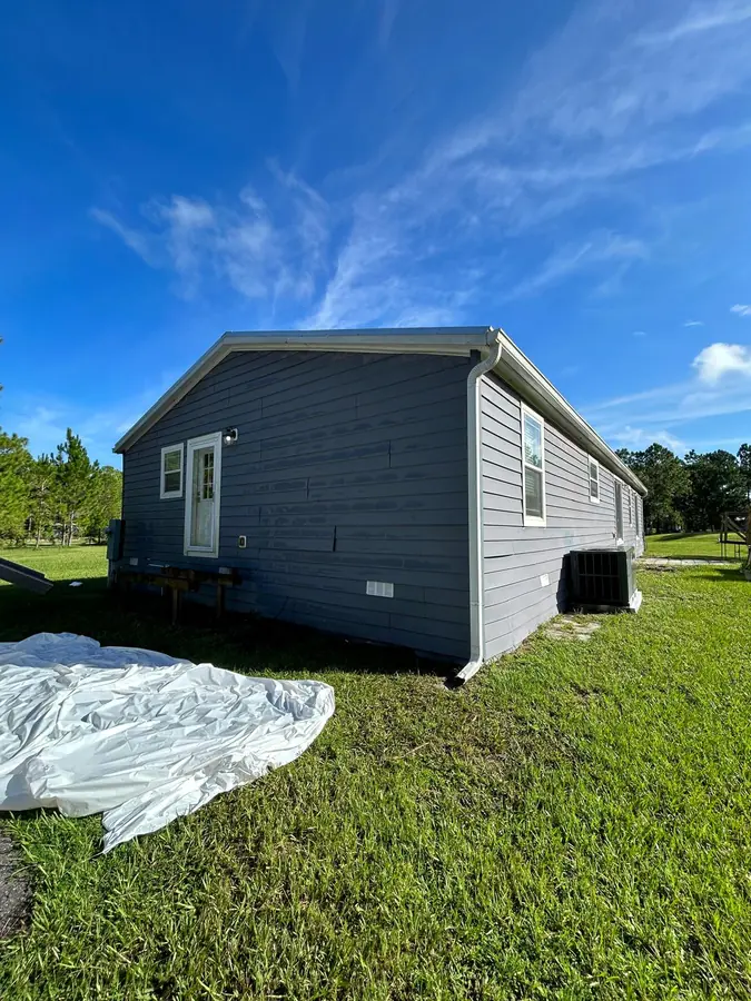 Completed residential siding installation by Endless Siding in Florida